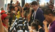 Canada's Prime Minister Justin Trudeau orders food at a counter during his visit at a Jollibee fast food restaurant in Tondo city, metro Manila, Philippines November 12, 2017. (REUTERS/Czar Dancel)
