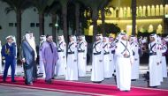 Emir H H Sheikh Tamim bin Hamad Al Thani and H M King Mohammed VI of Morocco reviewing the guard of honour at the Emiri Diwan yesterday.
