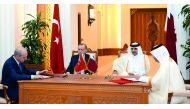 Emir H H Sheikh Tamim bin Hamad Al Thani and Turkish President, Recep Tayyip Erdogan, at the signing of cooperation agreement, yesterday.