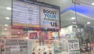 A sign outside a licensed money transfer company in Kuala Lumpur, Malaysia on November 2, 2017. Thomson Reuters Foundation/ Beh Lih Yi
