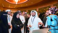 Minister of Public Health H E Dr Hanan Mohamed Al Kuwari visiting the Ooredoo stand with senior executives.