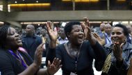 Delegates celebrate after Zimbabwean President Robert Mugabe was dismissed as party leader at an extraordinary meeting of the ruling ZANU-PF's central committee in Harare, Zimbabwe November 19, 2017. Reuters/Philimon Bulawayo


