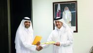 Qatar Post Chairman and Managing Director Faleh Mohammed Al Nuaimi and Nasser Saeed Al Nuaimi, Deputy Chief Quality Officer and Co-Director for Hamad Healthcare Quality Institute at HMC at the signing ceremony.