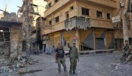 A file photo of demolished houses in Syria. AFP.