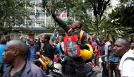 Jubilee Party supporters celebrate after Kenya's Supreme Court upheld the re-election of President Uhuru Kenyatta in last month's repeat presidential vote, in Nairobi, Kenya November 20, 2017. REUTERS/Baz Ratner.