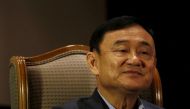 FILE PHOTO: Former Thai Prime Minister Thaksin Shinawatra looks on as he speaks to Reuters during an interview in Singapore February 23, 2016. REUTERS/Edgar Su/File Photo.