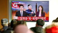 People watch a TV broadcasting a news report on North Korea firing what appeared to be an intercontinental ballistic missile (ICBM) that landed close to Japan, in Seoul, South Korea, November 29, 2017. REUTERS/Kim Hong-Ji