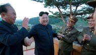 FILE PHOTO: North Korean leader Kim Jong Un reacts with Ri Pyong Chol (L) in this undated photo released by North Korea's Korean Central News Agency (KCNA) on May 15, 2017.