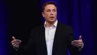 (FILES) File photo dated September 29, 2017 shows billionaire entrepreneur and founder of SpaceX Elon Musk speaking at the 68th International Astronautical Congress 2017 in Adelaide. AFP / PETER PARKS
