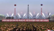 This December 1, 2017 picture released by North Korea's official Korean Central News Agency (KCNA) on December 2, 2017 shows North Korean soldiers and Pyongyang residents holding a rally to celebrate the North's declaration on November 29 it had achieved 
