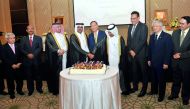 Minister of Energy and Industry H E Dr Mohammed bin Saleh Al Sada (fourth left) and Secretary-General of the Ministry of Foreign Affairs H E Dr Ahmad Hassan Al Hamadi (fourth right), Director of the Protocol Department Ambassador Ibrahim Yousif Abdullah F