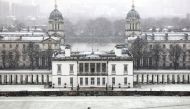 A pedestrian walks through the snow in Greenwich Park, next to National Maritime Museum, London, Britain, December 10, 2017. REUTERS/Simon Dawson TPX IMAGES OF THE DAY