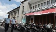 A file photo of Security personnel walking in front of Kerobokan prison in Denpasar, Bali, Indonesia. Antara Foto/Nyoman Budhiana via REUTERS