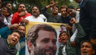 Supporters of the Congress Party shout slogans after the party named Rahul Gandhi president, outside Congress headquarters in New Delhi on December 11, 2017. (AFP / SAJJAD HUSSAIN)