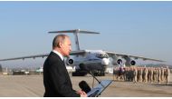 Russian President Vladimir Putin addresses during his visit at Khmeimim Air Base in Latakia, Syria on December 11, 2017. Kremlin Press Office / Handout - Anadolu 
