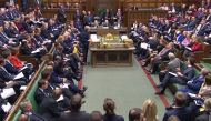 A video grab from footage broadcast by the UK Parliament's Parliamentary Recording Unit (PRU) shows British Prime Minister Theresa May making a statement to lawmakers regarding the Brexit phase one negotiations interim deal in the House of Commons in Lond