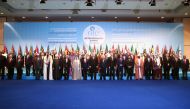 Turkish President Recep Tayyip Erdogan (C) poses with participants for a family photo within the extraordinary summit of the Organization of Islamic Cooperation (OIC) in Istanbul, Turkey on December 13, 2017.
Kayhan Özer - Anadolu
