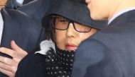 Choi Soon-Sil arrives at the Seoul Central District Prosecutor's Office in Seoul on October 31, 2016. Yonhap/AFP.
