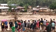 People help to rescue flood victims in Lanao Del Norte, Philippines, December 22, 2017 in this image taken from video footage obtained from social media. Climah Cabugatan Disumala via REUTERS