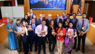 Students from five different countries who stayed at Weill Cornell Medicine-Qatar for a week, pose for a photograph.