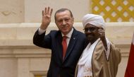 President of Turkey Recep Tayyip Erdogan (L) and President of Sudan Omar Al-Bashir (R) gesture during a joint press conference following their inter-delegation meeting in Khartoum, Sudan on December 24, 2017. Binnur Ege Gürün - Anadolu