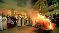 Iraqi Christians pray during a mass on Christmas eve at Church of Saint George in Teleskof, Iraq December 24, 2017. REUTERS/Ari Jalal