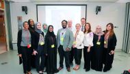 Speakers with some participants during the symposium. 