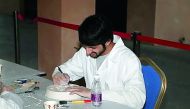 People taking part in the training courses on traditional handicraft.