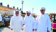 Katara General Manager Dr. Khalid bin Ibrahim Al Sulaiti accompanying Kuwait Ambassador Hafiz Mohammad Al Ajmi and Oman Ambassador Najib bin Yahya Al Balushi during a tour of the fair at the Mahaseel Festival.