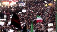 An image grab taken from a broadcast by Islamic Republic of Iran Broadcasting (IRIB) on January 1, 2018, shows Iranians chanting slogans as they march in support of the government in the northwestern city of Zanjan. AFP PHOTO / HO / IRIB