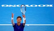 Serbia's Novak Djokovic reacts to the crowd after winning his match against Austria's Dominic Thiem. REUTERS/David Gray