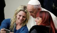 Pope Francis poses for a selfie as he leads the general audience in Paul VI hall at the Vatican January 10, 2018. Reuters/Max Rossi