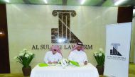 Engineer Meshal Al Shamari and Mubarak Al Sulaiti signing the Memorandum of Understanding.