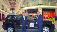 Former Chargé d’Affaires for the US Embassy in Doha, William Grant, and Mahmoud Skhiri, General Sales Manager of Mannai Automotive, during the Discover America Festival featuring the GMC Terrain at the Landmark.