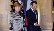 French President Emmanuel Macron (R) and German Chancellor Angela Merkel (L) leave the Elysee palace after their meeting in Paris, France, 19 January 2018. Merkel is in Paris for a one-day work visit. EPA/CHRISTOPHE PETIT TESSON