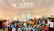Children with volunteers, healthcare practitioners and other officials during the 18th Al Bawasil Diabetes Camp, organised by Qatar Diabetes Association (QDA). 
