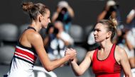 Simona Halep of Romania shakes hands with Karolina Pliskova of Czech Republic after Halep won their match. Reuters/Edgar Su