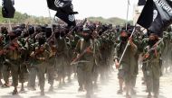 FILE PHOTO: New recruits of Somalia's al-Qaeda linked al Shabaab militia march during a passing out parade at a military training base in Afgoye, west of Mogadishu, Somalia February 17, 2011. REUTERS/Feisal Omar/File Photo