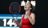  Simona Halep of Romania celebrates winning against Angelique Kerber of Germany. REUTERS/Issei Kato