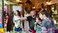 Participants of the Souq Waqif tours visit a section of the souq selling spices and herbs.
