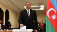 File photo of Azerbaijan's President Ilham Aliyev casts his vote during a referendum on extending presidential terms in Baku, Azerbaijan, September 26, 2016. REUTERS/AZERTAC/Vugar Amrullayev/Pool