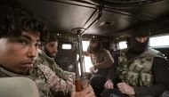 Turkey-backed Free Syrian Army fighters are seen in their vehicle in al Ajami village in east al Bab, Syria February 3,2018.REUTERS/ Khalil Ashawi