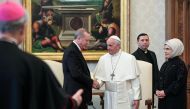 Turkey's President Recep Tayyip Erdogan (L) and his wife Emine (R) meet with Pope Francis (C) during a private audience on February 5, 2018 at the Vatican. AFP / Alessandro DI MEO