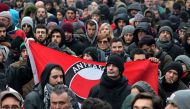 Peple take part in an anti-racism demonstration in the central Italian town of Macerata, on February 10, 2018, one week after an attack that injured at least six migrants. (AFP / TIZIANA FABI)