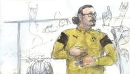 In this courtroom sketch created on January 26, 2018, at the palais de Justice court in Paris, shows Jawad Bendaoud gesturing while standing in the dock during his trial in which he stands accused of harbouring two of the jihadists in the aftermath of the