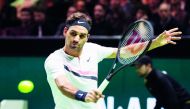 Swiss tennis player Roger Federer of Switzerland jubilates returns a ball to Germany Philipp Kohlschreiber during their second round match of the ABN AMRO World Tennis Tournament in Rotterdam on February 15, 2018. AFP / ANP / Koen Suyk