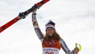 Ester Ledecka of Czech Republic reacts during the victory ceremony, February 17, 2018. REUTERS/Leonhard Foeger
 
