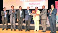 Dr R. Seetharaman (centre), Group CEO of Doha Bank, receives ‘Excellence Award’ from ASP Liyanage, Sri Lankan Ambassador to Qatar, and Sanath Kohowilage, President Sri Lanka Coordinating Committee Qatar, during the  cultural event held to celebrate Sri La