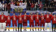 Russian team sings their national anthem while wearing their gold medals. REUTERS/Grigory Dukor