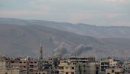 Smoke rises after Assad Regime carried out an airstrike to Arbin town of Eastern Ghouta in Damascus, Syria on February 24, 2018. Diaa Al Din - Anadolu 
